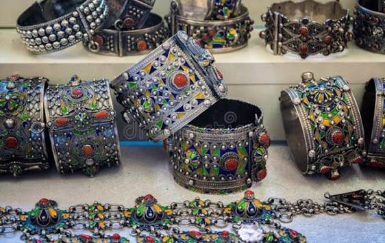 Kabyle bracelets and jewelry decorated with colored enamel and coral-red stones