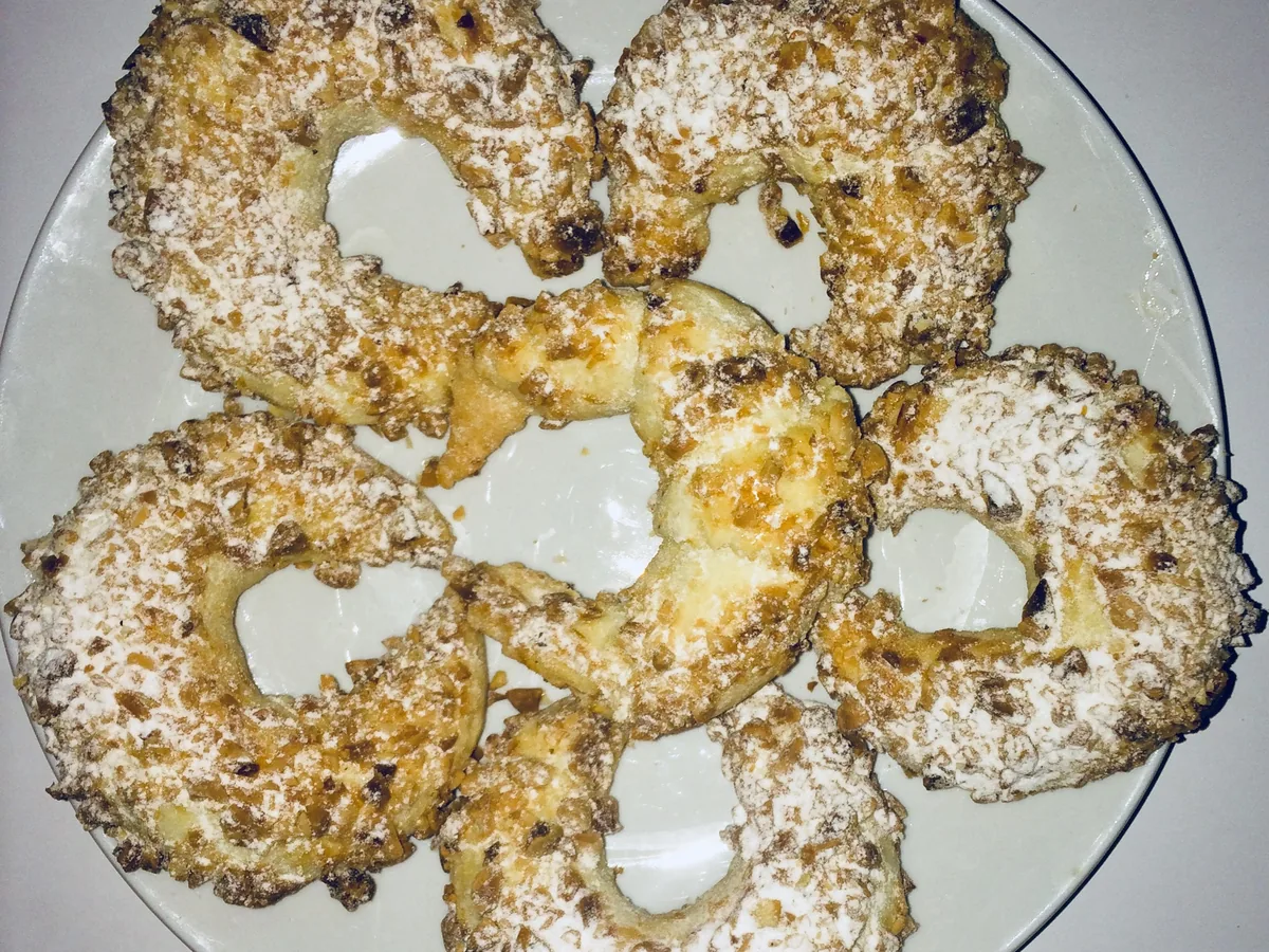 Crescent-shaped Algerian Tcharek pastries filled with almonds.